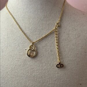 Christian Dior Elegant Gold Necklace with Christian Dior Pendant